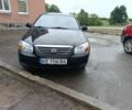 Черный Киа Черато, объемом двигателя 1.6 л и пробегом 343 тыс. км за 2572 $, фото 1 на Automoto.ua