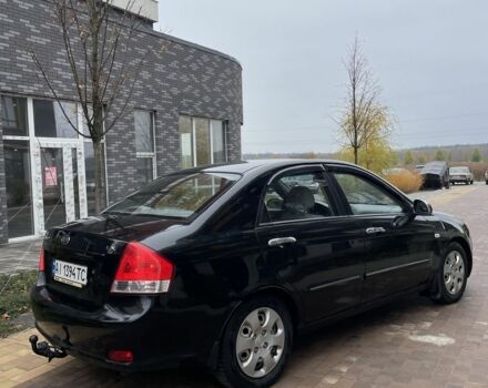 Черный Киа Черато, объемом двигателя 1.6 л и пробегом 256 тыс. км за 4200 $, фото 4 на Automoto.ua