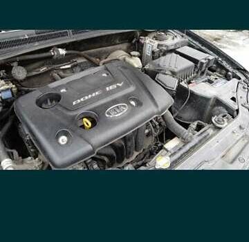 Черный Киа Черато, объемом двигателя 1.6 л и пробегом 221 тыс. км за 4900 $, фото 5 на Automoto.ua