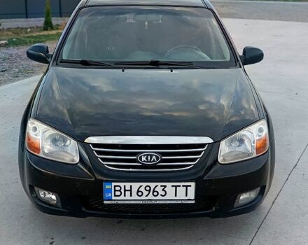 Черный Киа Черато, объемом двигателя 1.6 л и пробегом 210 тыс. км за 4000 $, фото 1 на Automoto.ua