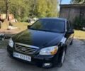 Чорний Кіа Черато, об'ємом двигуна 1.6 л та пробігом 124 тис. км за 5300 $, фото 1 на Automoto.ua