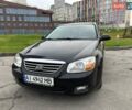 Черный Киа Черато, объемом двигателя 1.6 л и пробегом 232 тыс. км за 3850 $, фото 1 на Automoto.ua