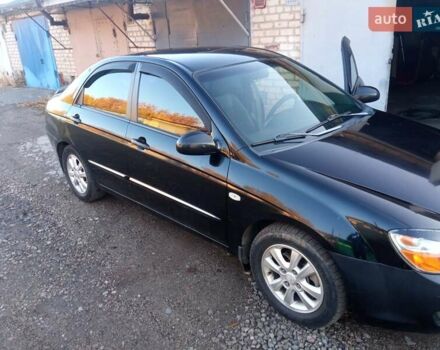 Черный Киа Черато, объемом двигателя 1.6 л и пробегом 228 тыс. км за 4300 $, фото 6 на Automoto.ua