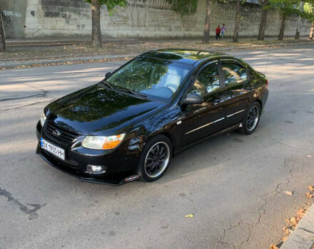 Чорний Кіа Черато, об'ємом двигуна 1.6 л та пробігом 140 тис. км за 5800 $, фото 12 на Automoto.ua