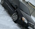 Черный Киа Черато, объемом двигателя 1.6 л и пробегом 225 тыс. км за 5099 $, фото 1 на Automoto.ua