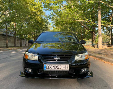 Чорний Кіа Черато, об'ємом двигуна 1.6 л та пробігом 140 тис. км за 5800 $, фото 2 на Automoto.ua