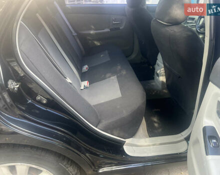 Чорний Кіа Черато, об'ємом двигуна 1.6 л та пробігом 290 тис. км за 5300 $, фото 20 на Automoto.ua