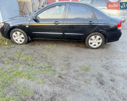 Чорний Кіа Черато, об'ємом двигуна 1.59 л та пробігом 250 тис. км за 4300 $, фото 5 на Automoto.ua