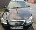 Чорний Кіа Черато, об'ємом двигуна 1.59 л та пробігом 188 тис. км за 5000 $, фото 1 на Automoto.ua