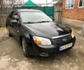 Черный Киа Черато, объемом двигателя 1.6 л и пробегом 240 тыс. км за 3300 $, фото 1 на Automoto.ua