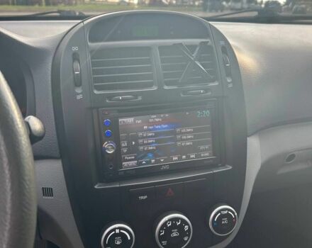 Черный Киа Черато, объемом двигателя 1.6 л и пробегом 292 тыс. км за 4000 $, фото 7 на Automoto.ua