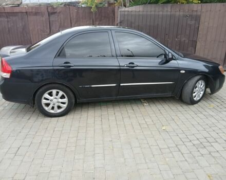 Черный Киа Черато, объемом двигателя 2 л и пробегом 250 тыс. км за 3700 $, фото 5 на Automoto.ua