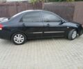 Черный Киа Черато, объемом двигателя 2 л и пробегом 250 тыс. км за 3700 $, фото 5 на Automoto.ua