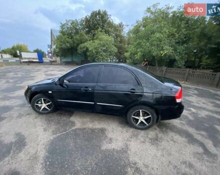 Чорний Кіа Черато, об'ємом двигуна 1.6 л та пробігом 337 тис. км за 5000 $, фото 1 на Automoto.ua