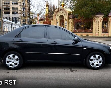 Черный Киа Черато, объемом двигателя 1.6 л и пробегом 204 тыс. км за 3700 $, фото 1 на Automoto.ua