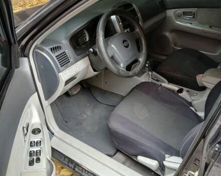 Черный Киа Черато, объемом двигателя 2 л и пробегом 250 тыс. км за 3700 $, фото 10 на Automoto.ua