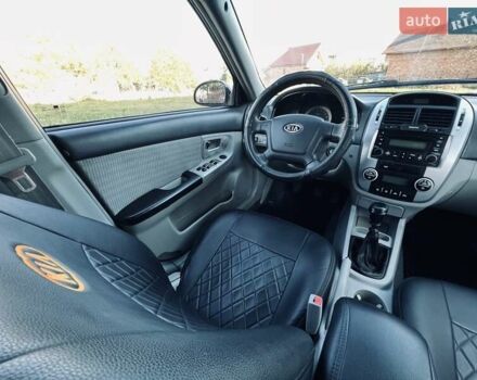 Черный Киа Черато, объемом двигателя 1.6 л и пробегом 210 тыс. км за 3750 $, фото 42 на Automoto.ua