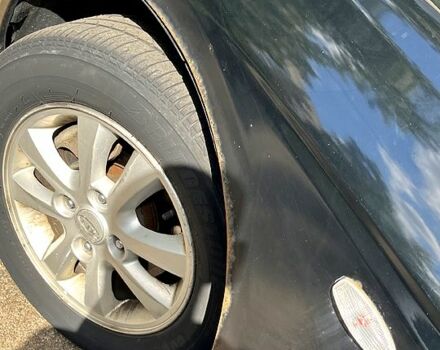 Черный Киа Черато, объемом двигателя 2 л и пробегом 163 тыс. км за 3000 $, фото 4 на Automoto.ua