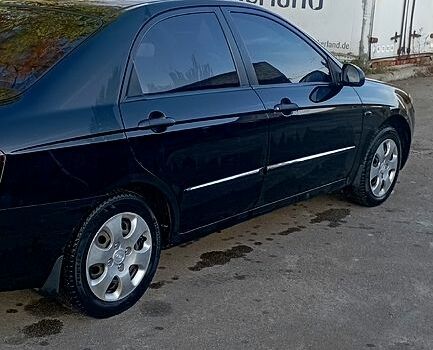 Кіа Черато 2007 у Сумах на Automoto.ua Чорний Кіа Черато, об'ємом двигуна 1.6 л та пробігом 221 тис. км за 4500 $, фото 3 на Automoto.ua