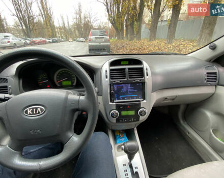 Черный Киа Черато, объемом двигателя 1.98 л и пробегом 306 тыс. км за 3800 $, фото 4 на Automoto.ua