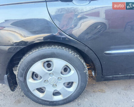 Чорний Кіа Черато, об'ємом двигуна 1.59 л та пробігом 250 тис. км за 4300 $, фото 8 на Automoto.ua