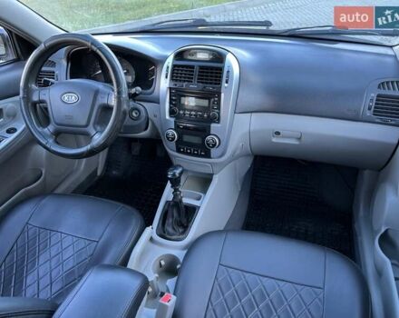 Черный Киа Черато, объемом двигателя 1.6 л и пробегом 210 тыс. км за 3650 $, фото 48 на Automoto.ua