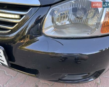 Чорний Кіа Черато, об'ємом двигуна 1.6 л та пробігом 106 тис. км за 5300 $, фото 25 на Automoto.ua