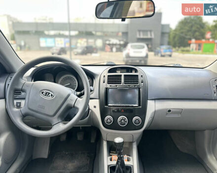 Чорний Кіа Черато, об'ємом двигуна 1.6 л та пробігом 272 тис. км за 5200 $, фото 7 на Automoto.ua