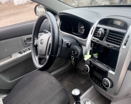 Черный Киа Черато, объемом двигателя 1.6 л и пробегом 126 тыс. км за 5200 $, фото 4 на Automoto.ua