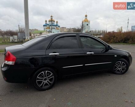 Чорний Кіа Черато, об'ємом двигуна 1.6 л та пробігом 224 тис. км за 4900 $, фото 22 на Automoto.ua