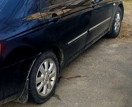 Чорний Кіа Черато, об'ємом двигуна 1.6 л та пробігом 154 тис. км за 5000 $, фото 2 на Automoto.ua