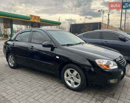 Черный Киа Черато, объемом двигателя 1.6 л и пробегом 180 тыс. км за 4900 $, фото 13 на Automoto.ua