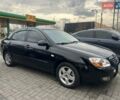 Черный Киа Черато, объемом двигателя 1.6 л и пробегом 180 тыс. км за 4900 $, фото 13 на Automoto.ua
