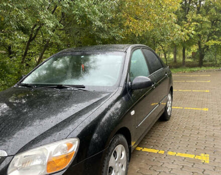 Чорний Кіа Черато, об'ємом двигуна 1.59 л та пробігом 232 тис. км за 4000 $, фото 2 на Automoto.ua