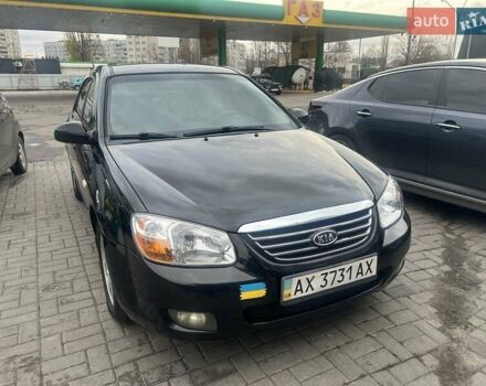 Черный Киа Черато, объемом двигателя 1.6 л и пробегом 180 тыс. км за 4900 $, фото 1 на Automoto.ua