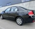 Чорний Кіа Черато, об'ємом двигуна 1.6 л та пробігом 184 тис. км за 4650 $, фото 3 на Automoto.ua