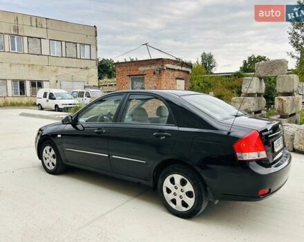 Черный Киа Черато, объемом двигателя 1.6 л и пробегом 95 тыс. км за 2999 $, фото 4 на Automoto.ua