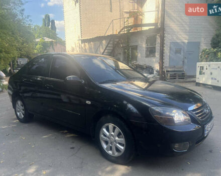 Чорний Кіа Черато, об'ємом двигуна 1.6 л та пробігом 290 тис. км за 5300 $, фото 2 на Automoto.ua