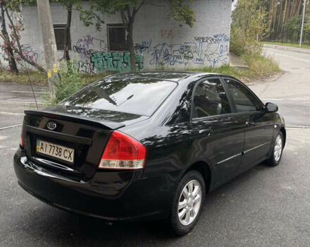 Черный Киа Черато, объемом двигателя 1.59 л и пробегом 210 тыс. км за 3500 $, фото 4 на Automoto.ua