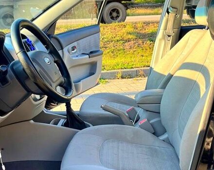 Черный Киа Черато, объемом двигателя 1.6 л и пробегом 199 тыс. км за 4250 $, фото 3 на Automoto.ua