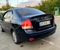 Черный Киа Черато, объемом двигателя 1.6 л и пробегом 264 тыс. км за 4370 $, фото 2 на Automoto.ua