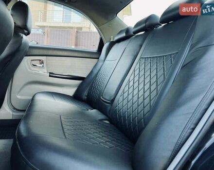 Черный Киа Черато, объемом двигателя 1.6 л и пробегом 210 тыс. км за 3650 $, фото 31 на Automoto.ua