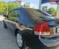 Черный Киа Черато, объемом двигателя 1.59 л и пробегом 219 тыс. км за 4600 $, фото 22 на Automoto.ua
