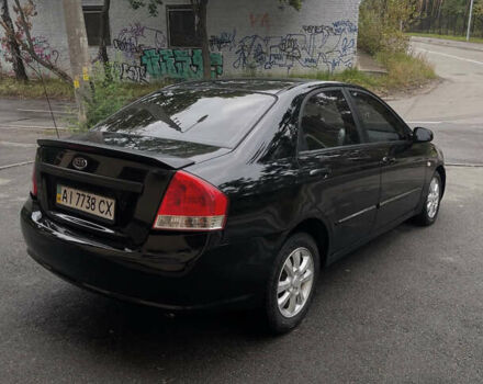 Черный Киа Черато, объемом двигателя 1.59 л и пробегом 273 тыс. км за 2999 $, фото 3 на Automoto.ua