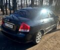Чорний Кіа Черато, об'ємом двигуна 1.6 л та пробігом 290 тис. км за 3700 $, фото 1 на Automoto.ua