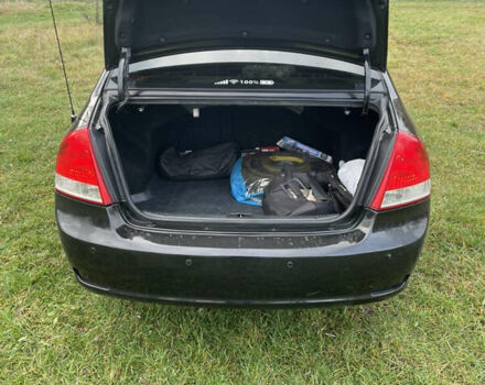 Черный Киа Черато, объемом двигателя 1.98 л и пробегом 315 тыс. км за 5745 $, фото 8 на Automoto.ua