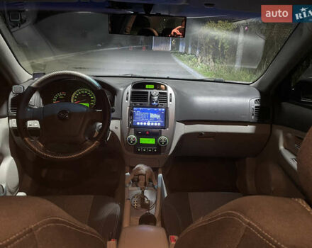 Черный Киа Черато, объемом двигателя 1.98 л и пробегом 315 тыс. км за 5745 $, фото 15 на Automoto.ua