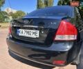 Чорний Кіа Черато, об'ємом двигуна 1.6 л та пробігом 106 тис. км за 5300 $, фото 14 на Automoto.ua