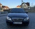Черный Киа Черато, объемом двигателя 1.6 л и пробегом 225 тыс. км за 4400 $, фото 1 на Automoto.ua