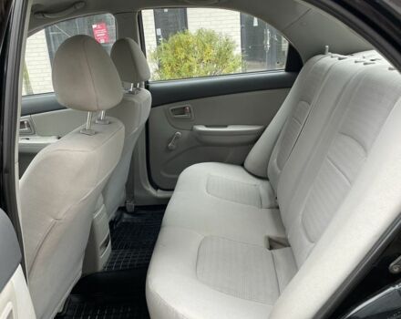 Черный Киа Черато, объемом двигателя 1.6 л и пробегом 256 тыс. км за 4200 $, фото 7 на Automoto.ua